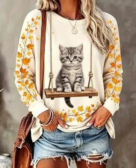 Damen Langarmshirt mit Katzenmotiv auf Schaukel und Herbstlaub
