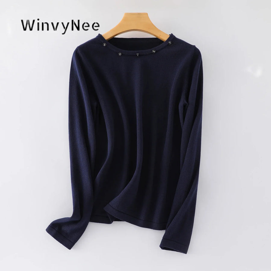 Damesshirt met lange mouwen, ronde hals en sierknopen