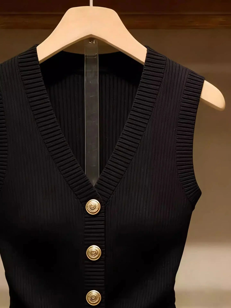 Dames mouwloze top van ribgebreid materiaal, zwart, met gouden knopen en V-hals