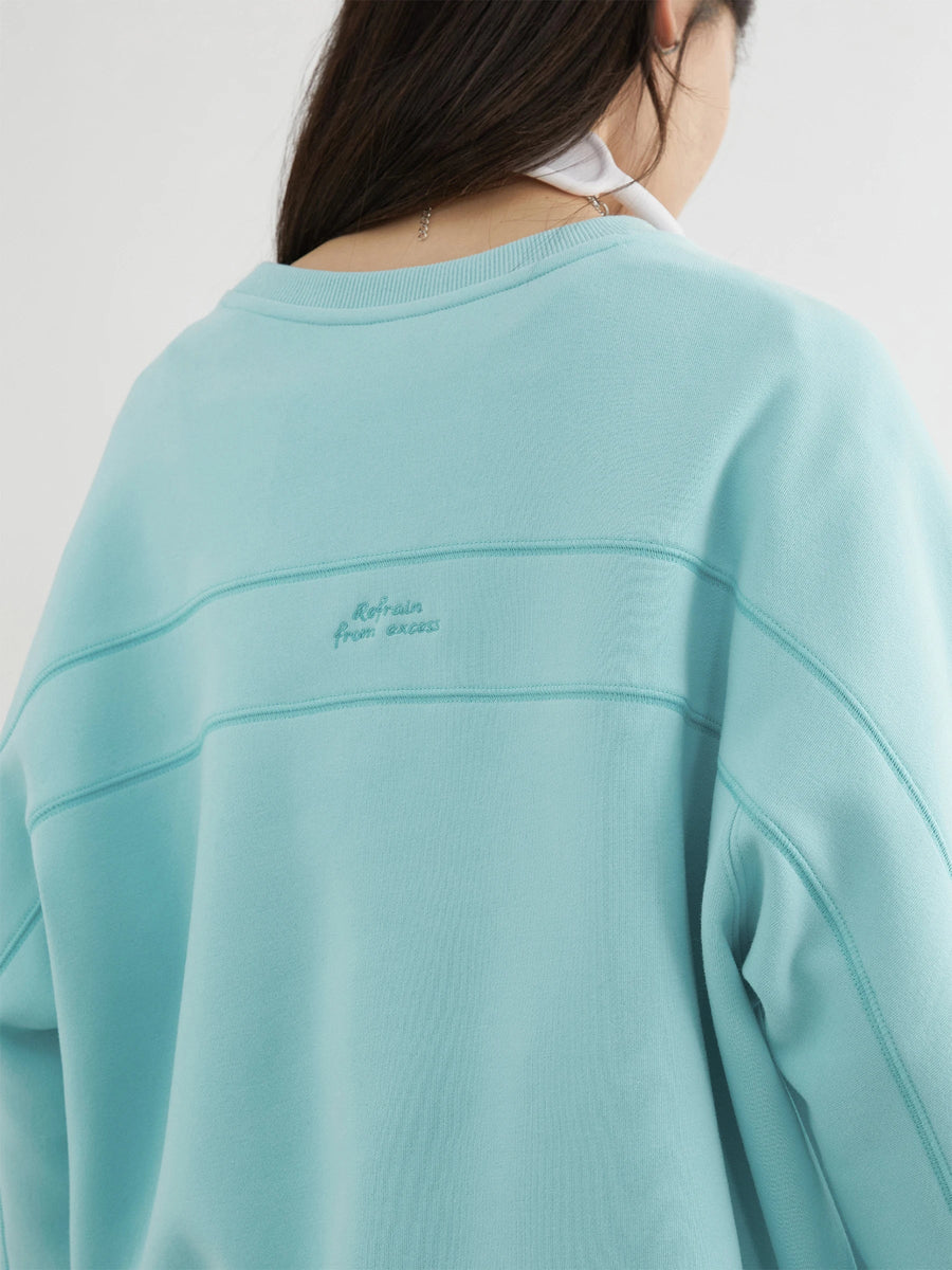 Dames sweatshirt met ronde hals en lange mouwen, met turquoise borduursel