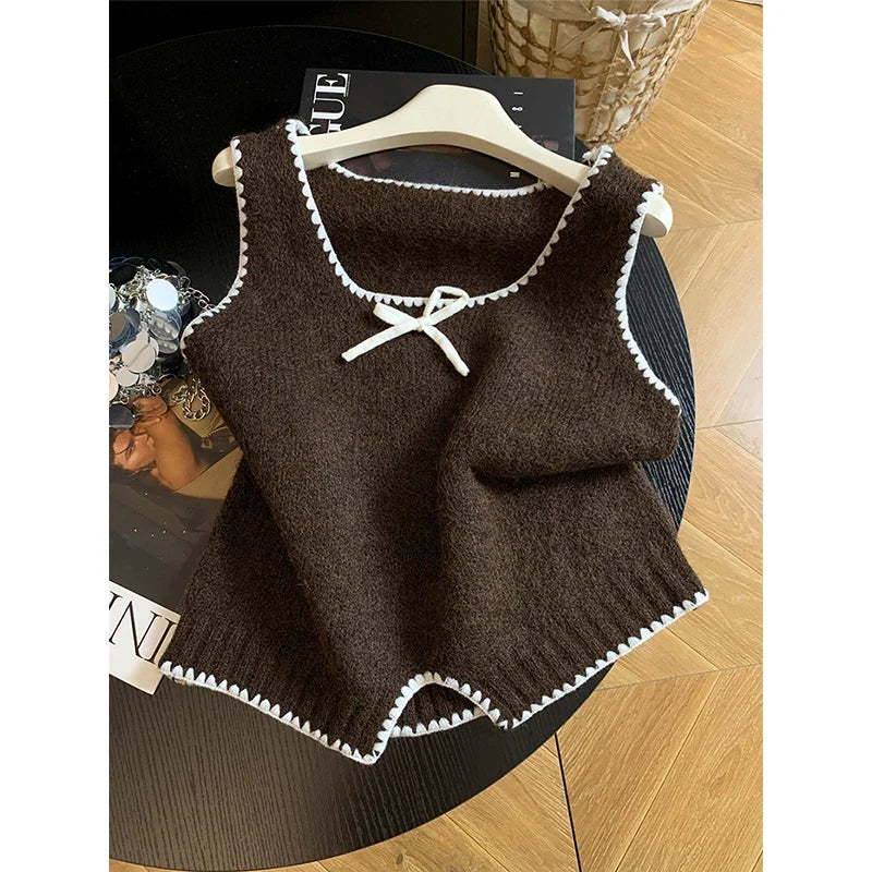 Damen Strickweste Ärmellos mit Schleife und Wellenkante