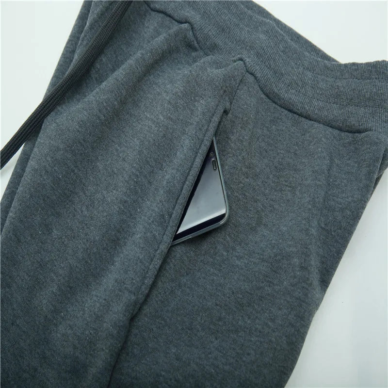 Uniseks joggingbroek van fleece, warm voor de winter, met boorden, zijzakken en trekkoord, zwart grijs wit