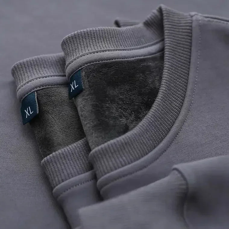 Unisex sweatshirt met lange mouwen, zachte binnenvoering, ronde hals en geribde boorden