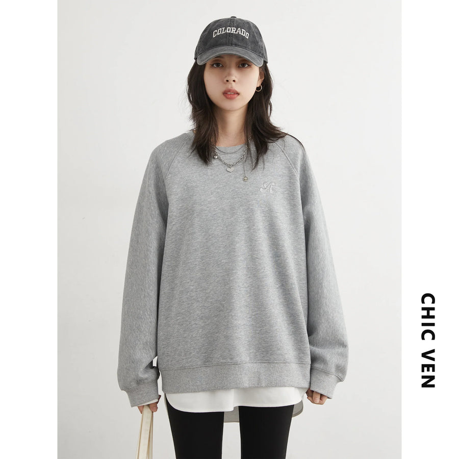 Dames sweatshirt met ronde hals en lange mouwen, met turquoise borduursel