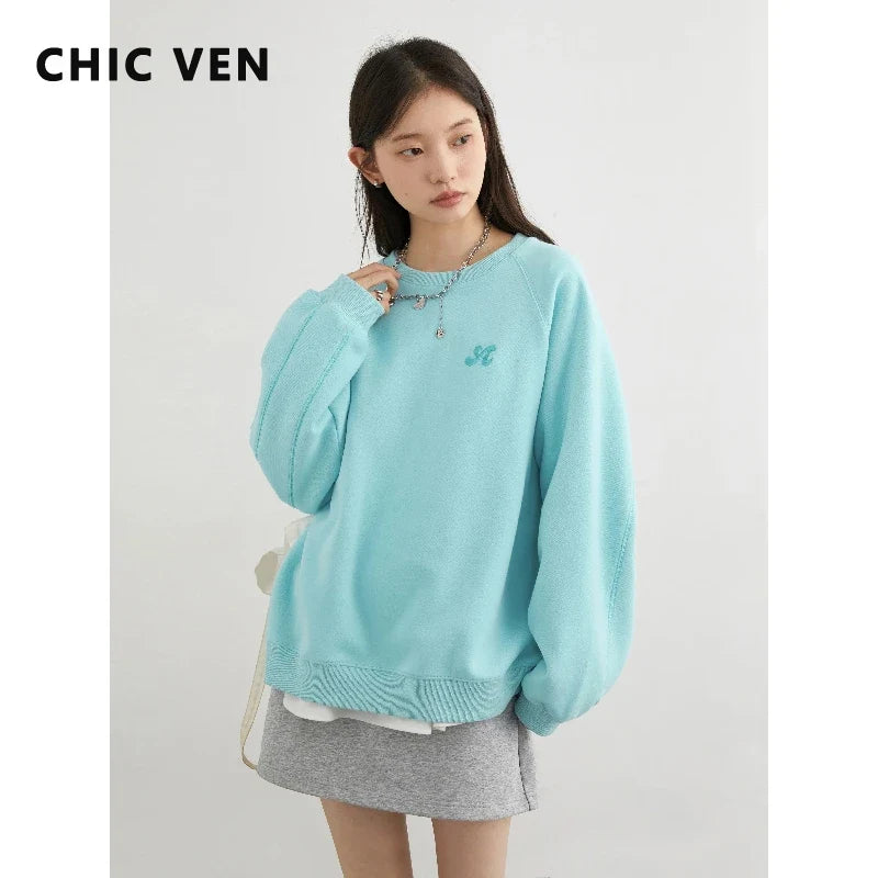 Dames sweatshirt met ronde hals en lange mouwen, met turquoise borduursel