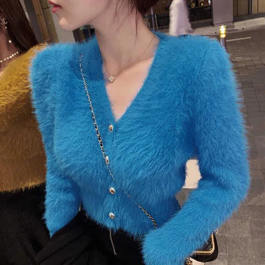 Kort fluffy damesvest met V-hals en knopenlijst, lichtblauw