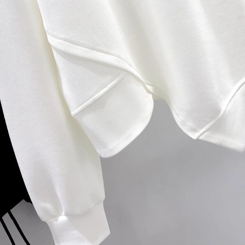 Unisex sweatshirt met lange mouwen, ronde hals en asymmetrische zoom