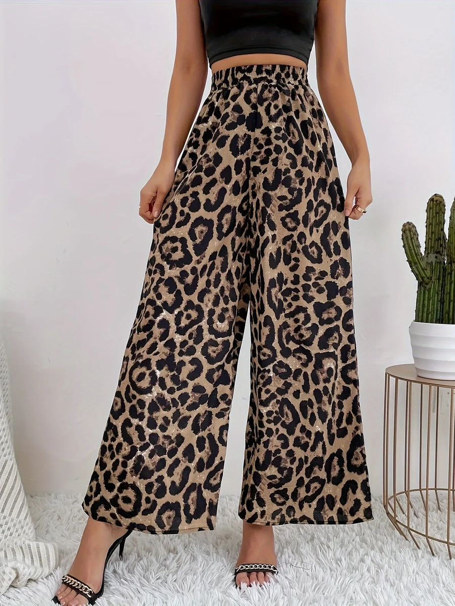 Damesbroek met wijde pijpen en luipaardprint, hoge taille
