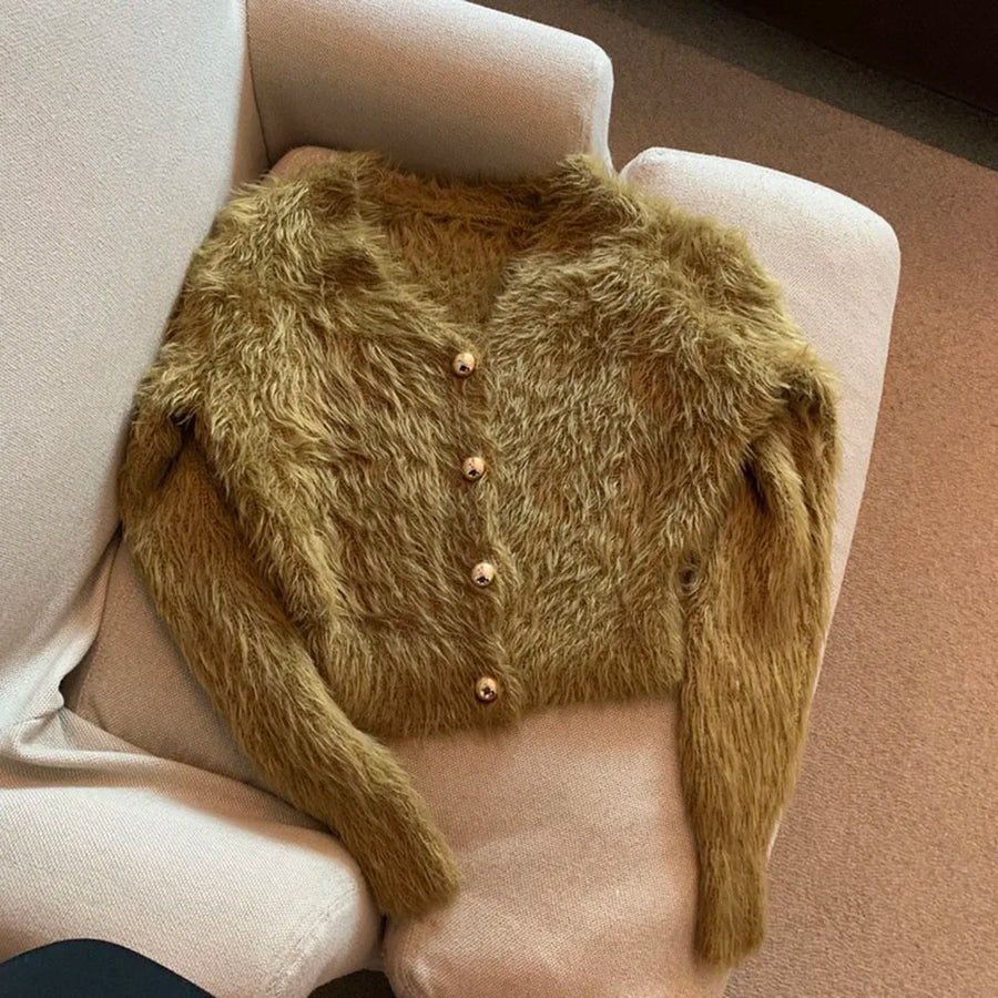 Kort fluffy damesvest met V-hals en knopenlijst, lichtblauw