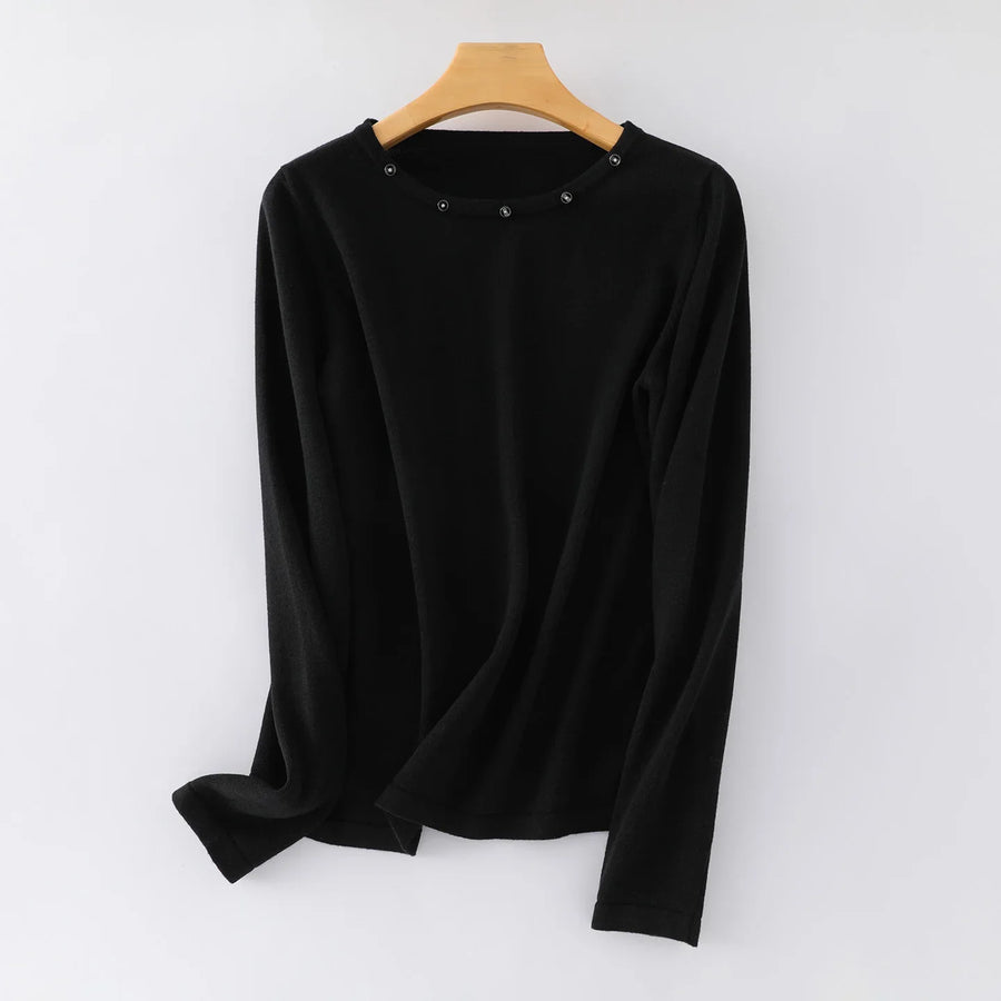 Damesshirt met lange mouwen, ronde hals en sierknopen