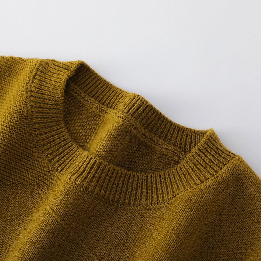 Damestrui met ronde hals, lange mouwen en textuurdetails