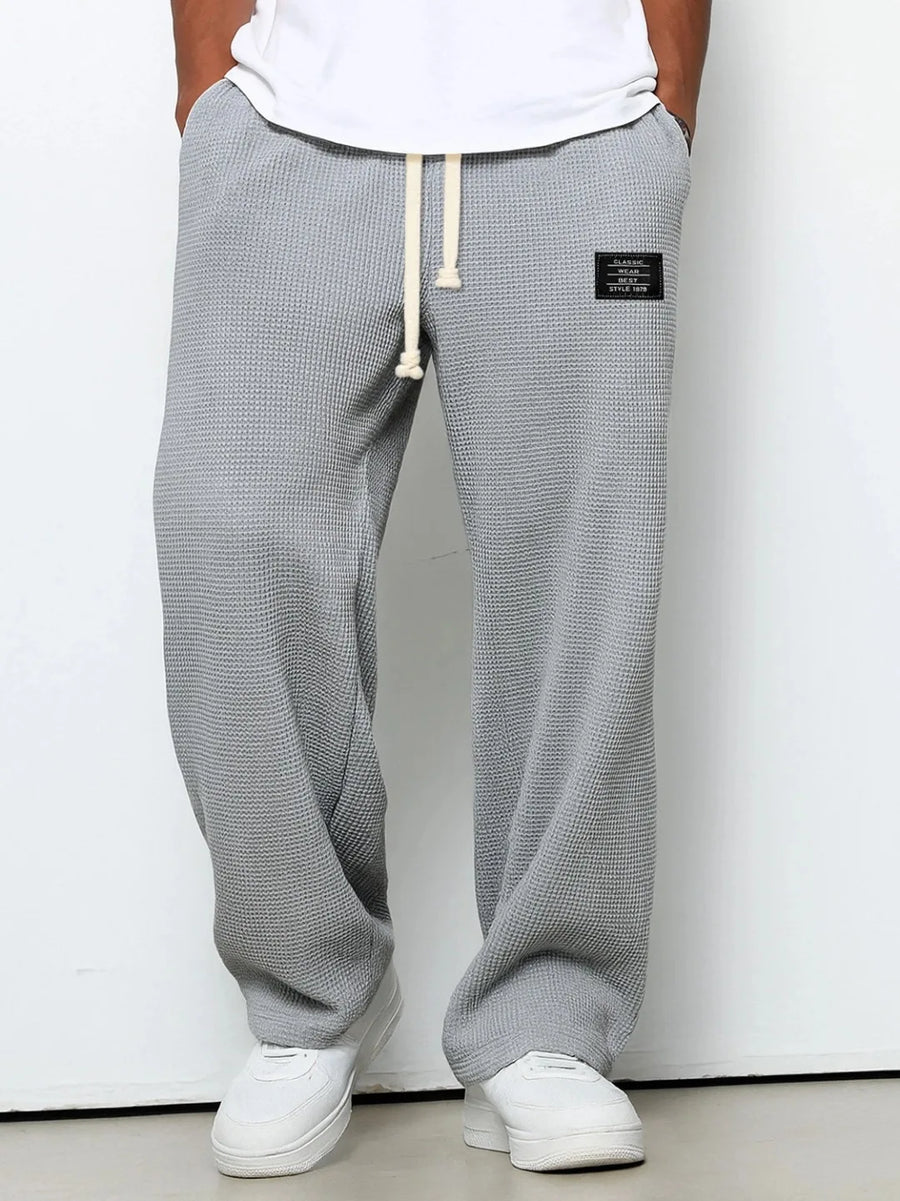 Unisex Waffel-Jogginghose mit Kordelzug und weitem Bein