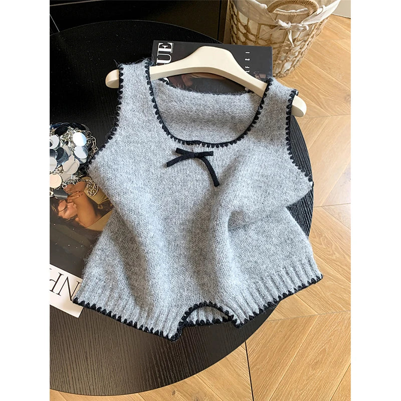 Damen Strickweste Ärmellos mit Schleife und Wellenkante