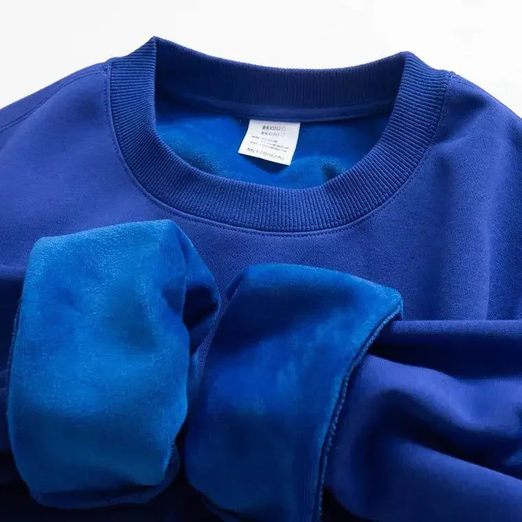 Unisex sweatshirt met lange mouwen, zachte binnenvoering, ronde hals en geribde boorden