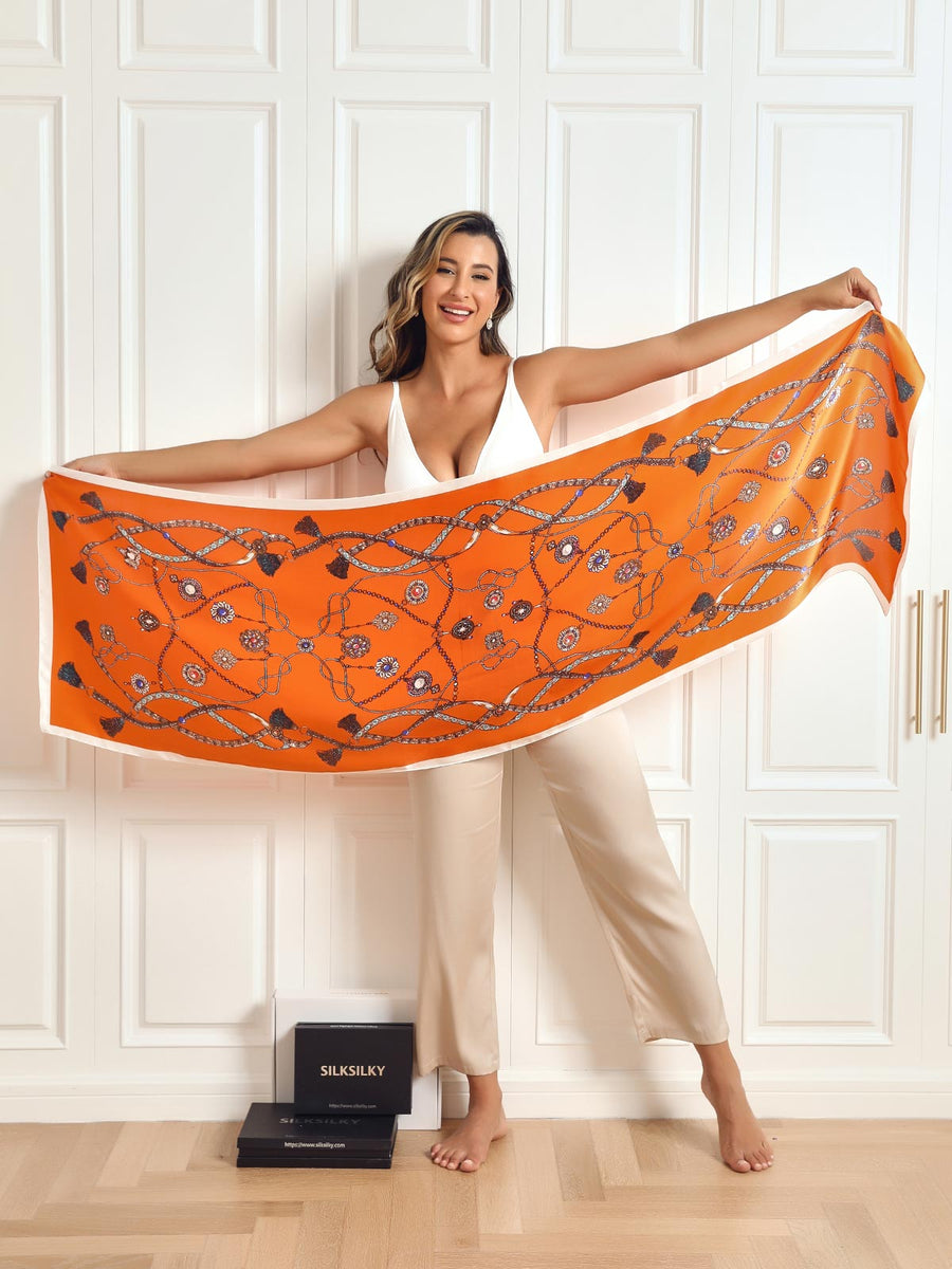 Dameshalsdoek met kettingmotief en kwastjesdetails in verschillende kleuren