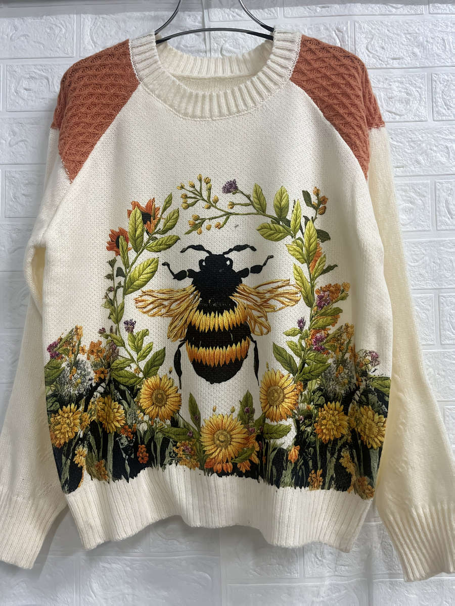 Creme-farbener Strickpullover mit Rundhalsausschnitt und Motiv