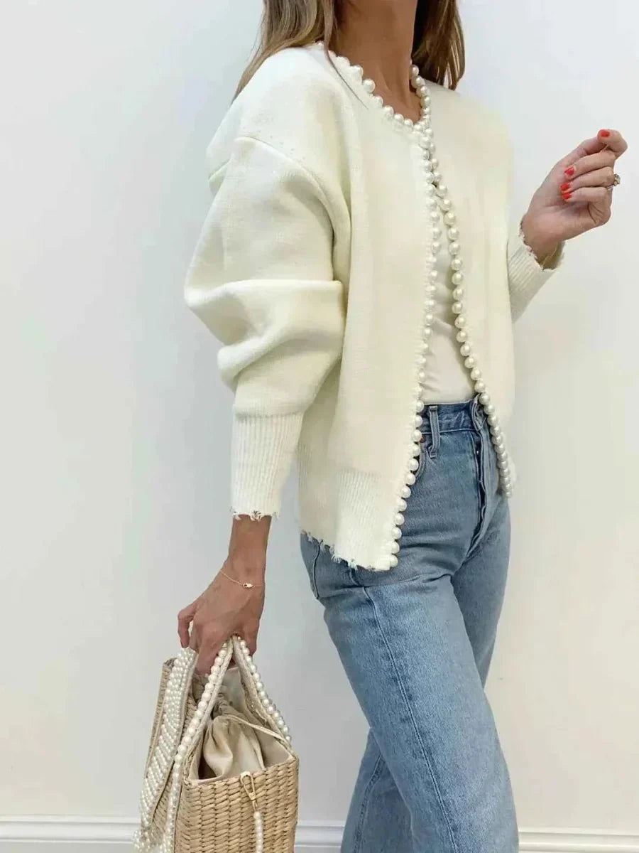 Off-white damesvest met parelversiering
