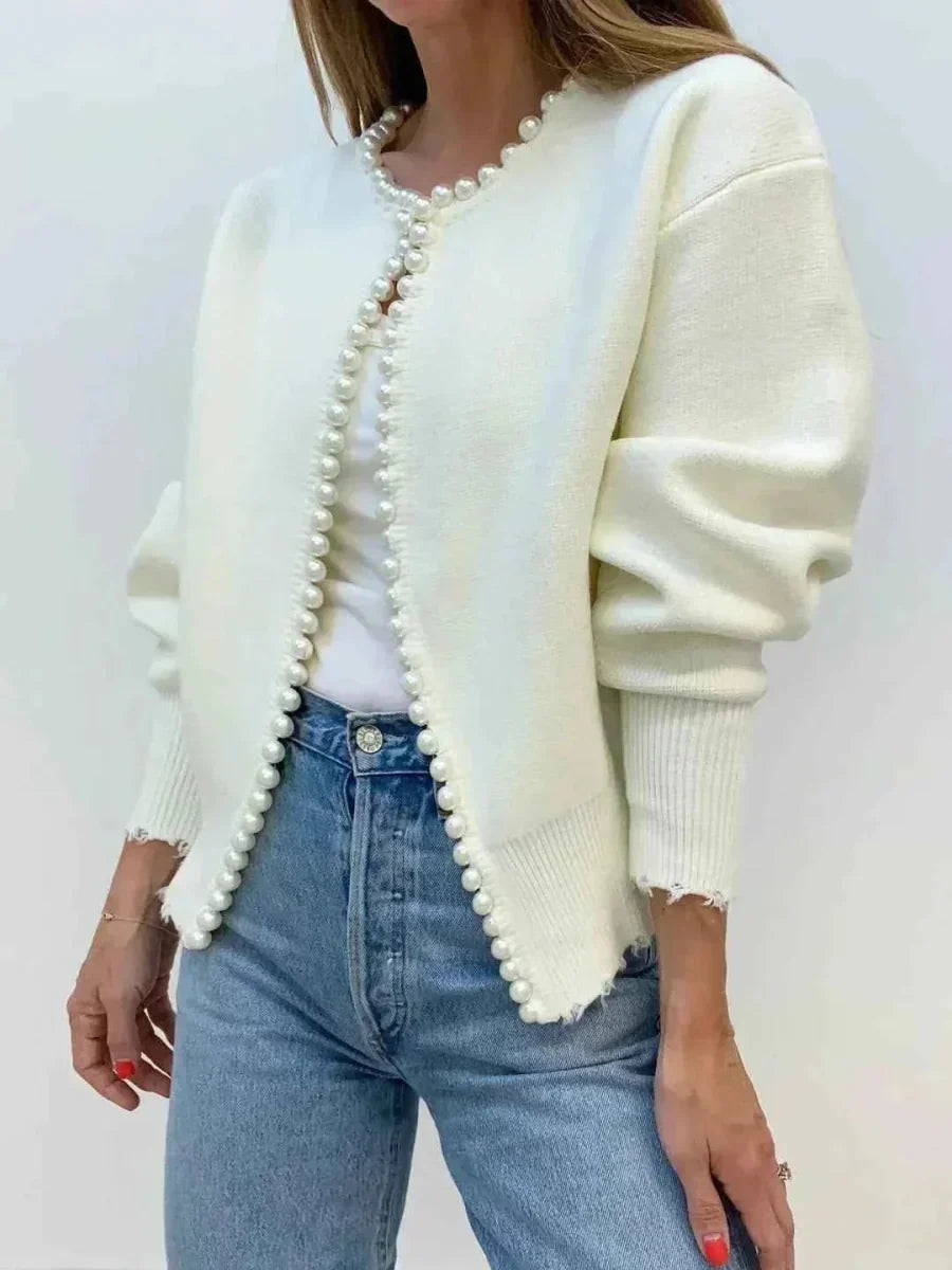 Off-white damesvest met parelversiering