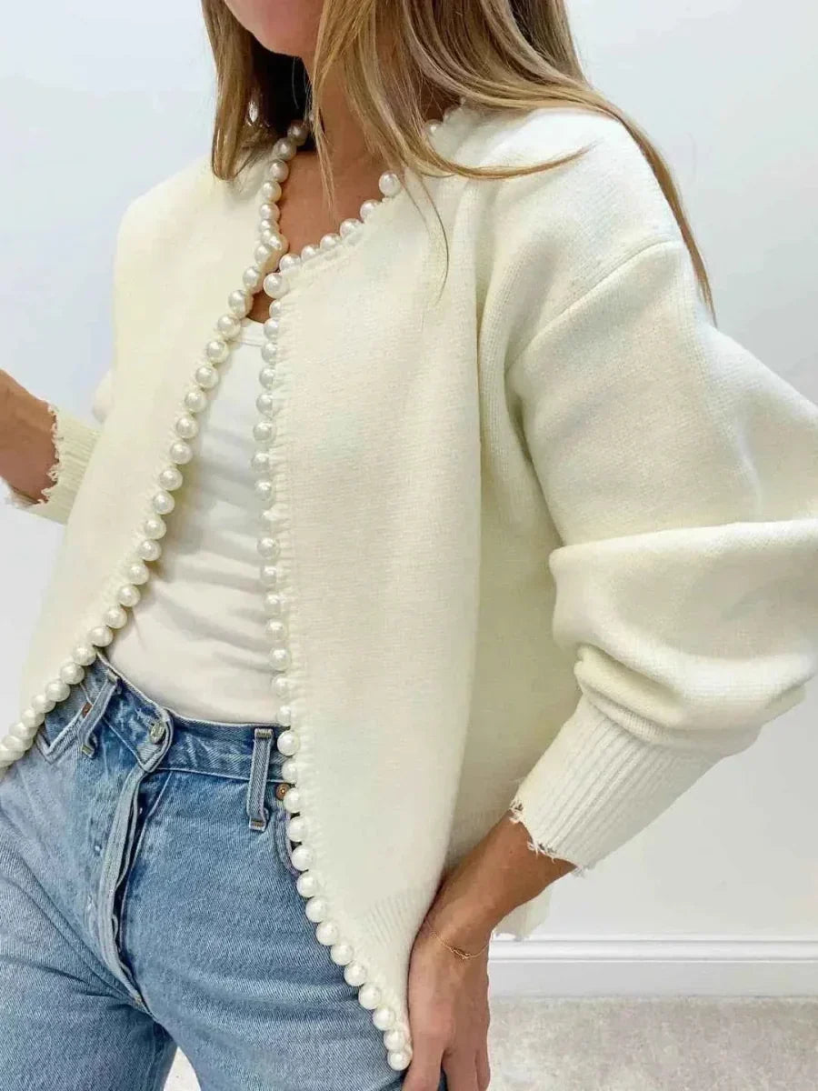Off-white damesvest met parelversiering
