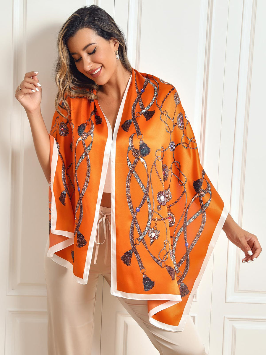 Dameshalsdoek met kettingmotief en kwastjesdetails in verschillende kleuren