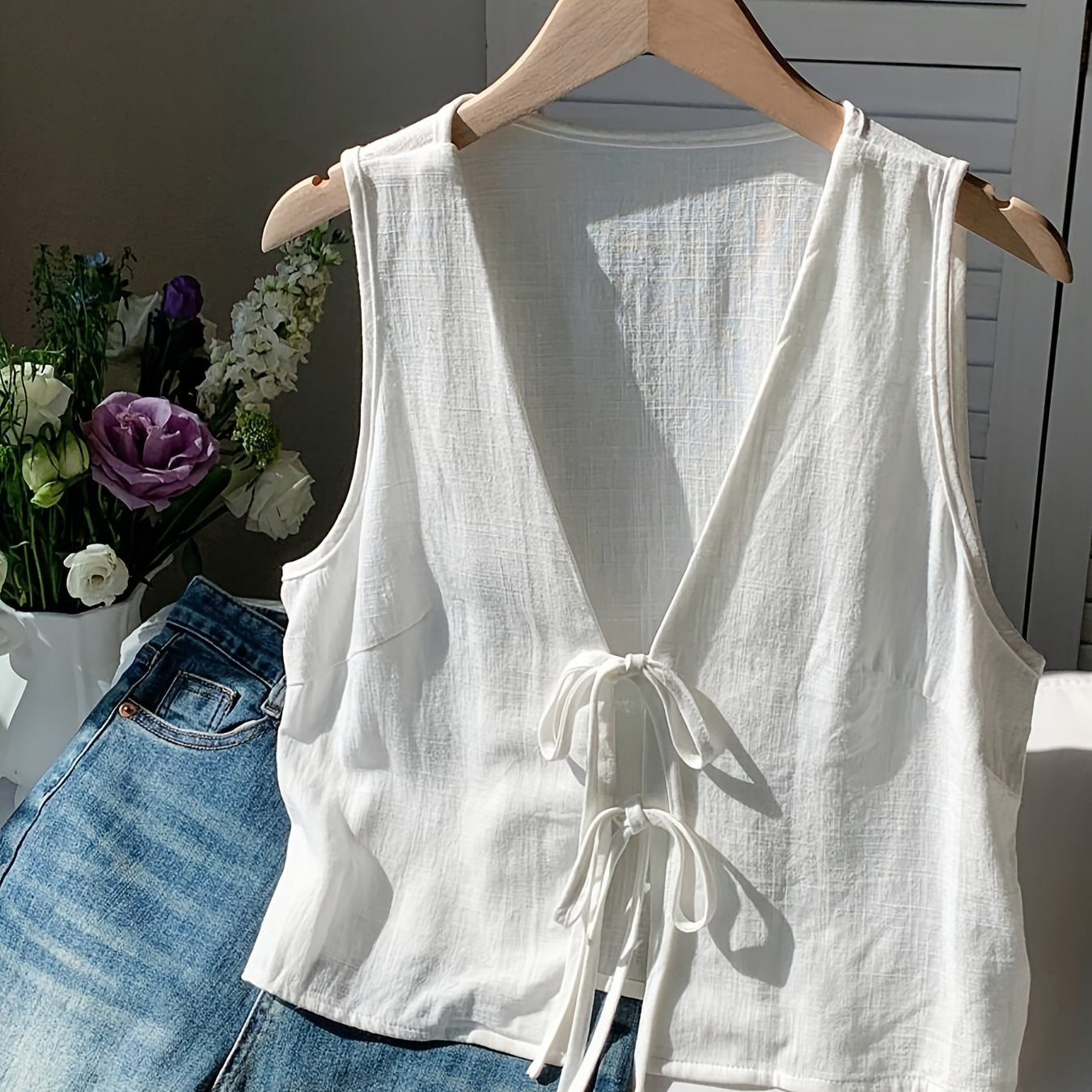 Damen ärmellose Weste mit Schleifen-Detail und V-Ausschnitt – Modische Layering-Weste für Freizeit und Alltag