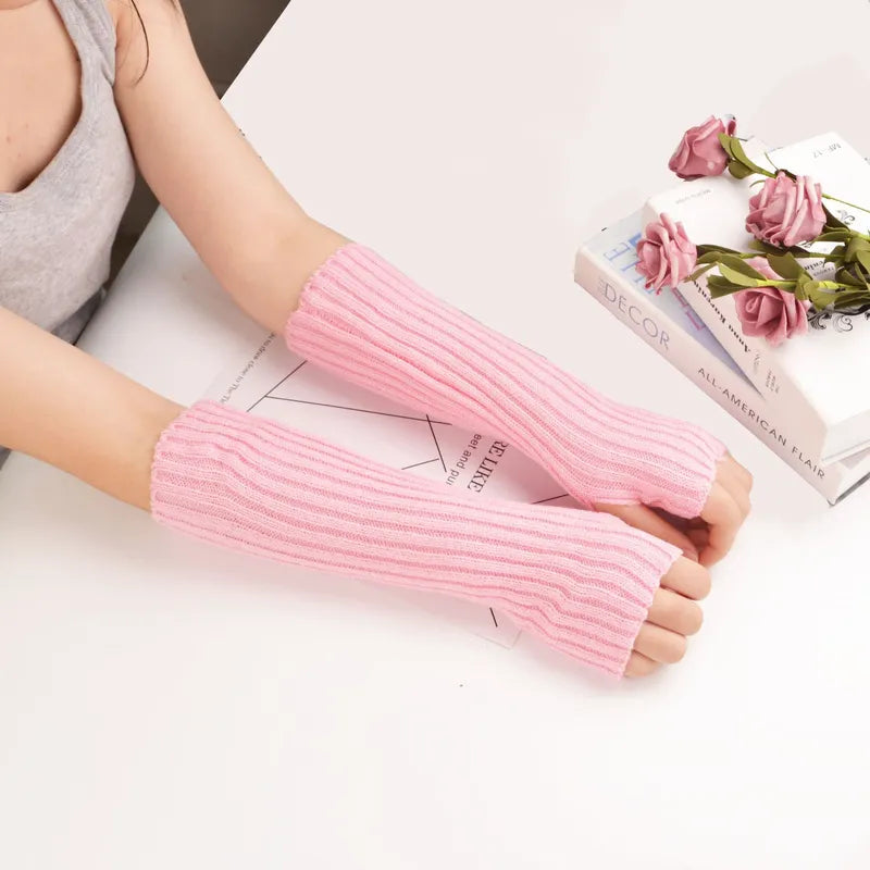 Lange gebreide damesarmwarmers zonder vingers