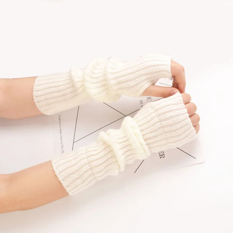 Lange gebreide damesarmwarmers zonder vingers