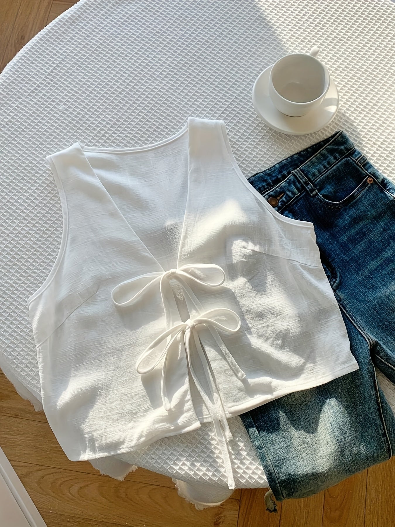 Damen ärmellose Weste mit Schleifen-Detail und V-Ausschnitt – Modische Layering-Weste für Freizeit und Alltag