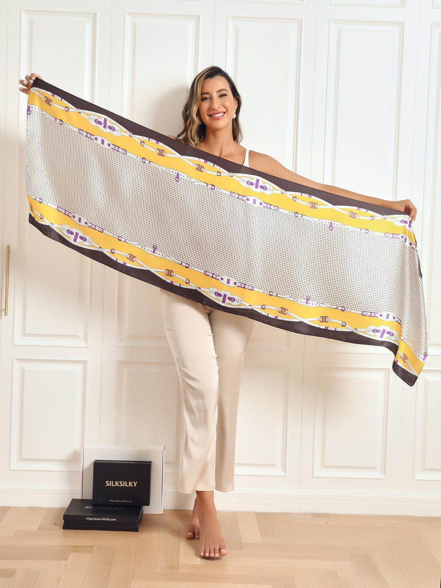 Dameshalsdoek met kettingmotief en kwastjesdetails in verschillende kleuren