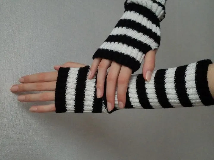 Lange gebreide damesarmwarmers zonder vingers