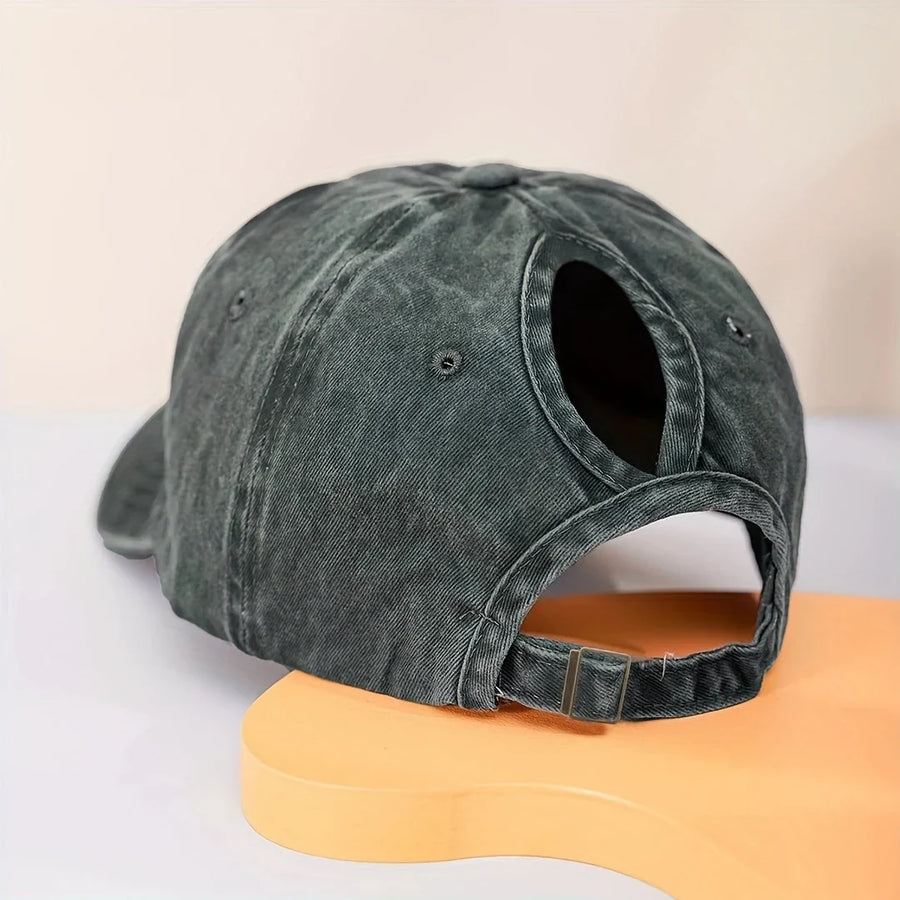 Baseballpet van corduroy met verwassen look en opening voor paardenstaart