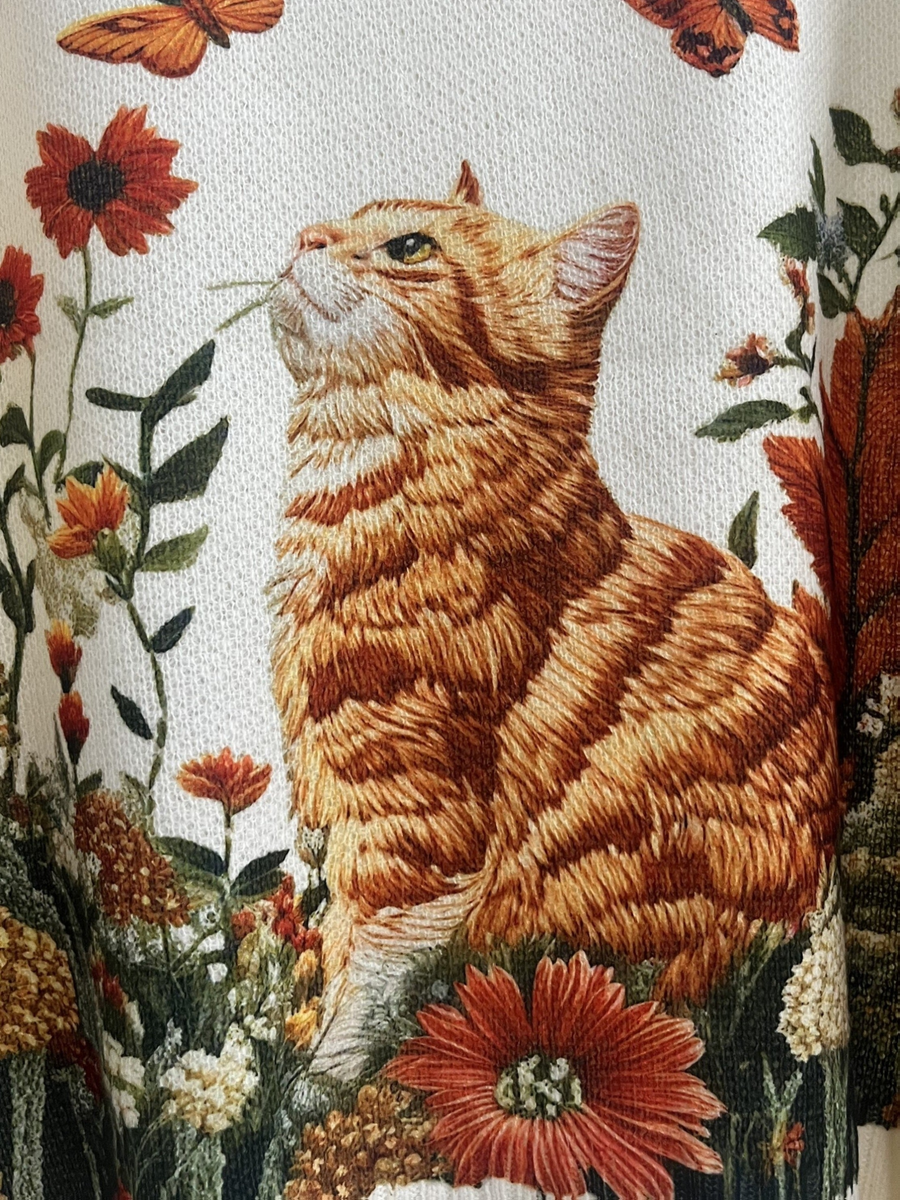 Creme-farbener Strickpullover mit Rundhalsausschnitt und Motiv