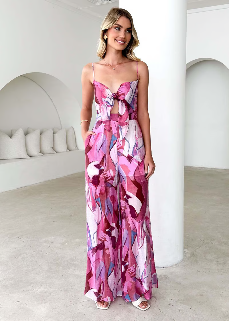 Damesjumpsuit met wijde pijpen, bustier en groen bladpatroon
