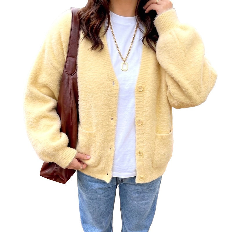 Gele damesgebreide cardigan met knopen en V-hals
