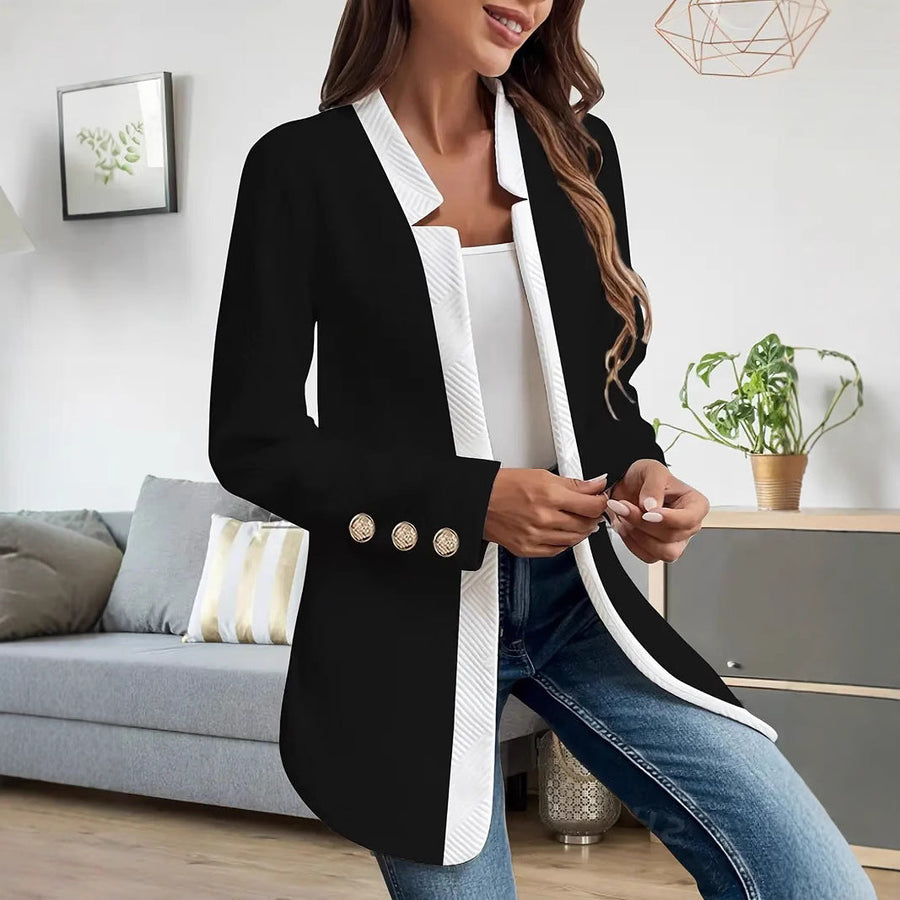 Lange damesblazer met contrasterende revers en sierknopen