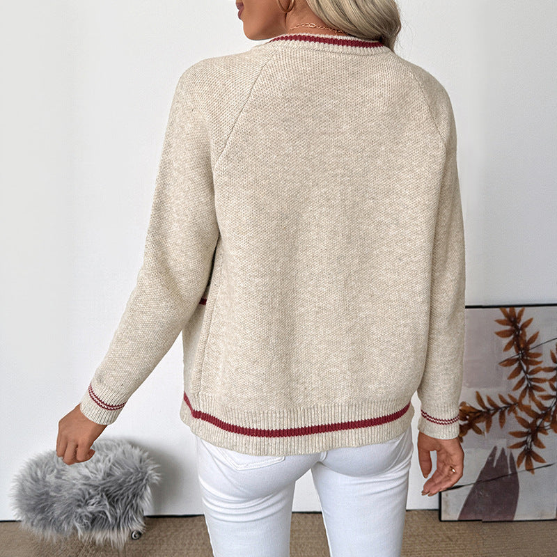 Beige damesvest met rits en rode strepen