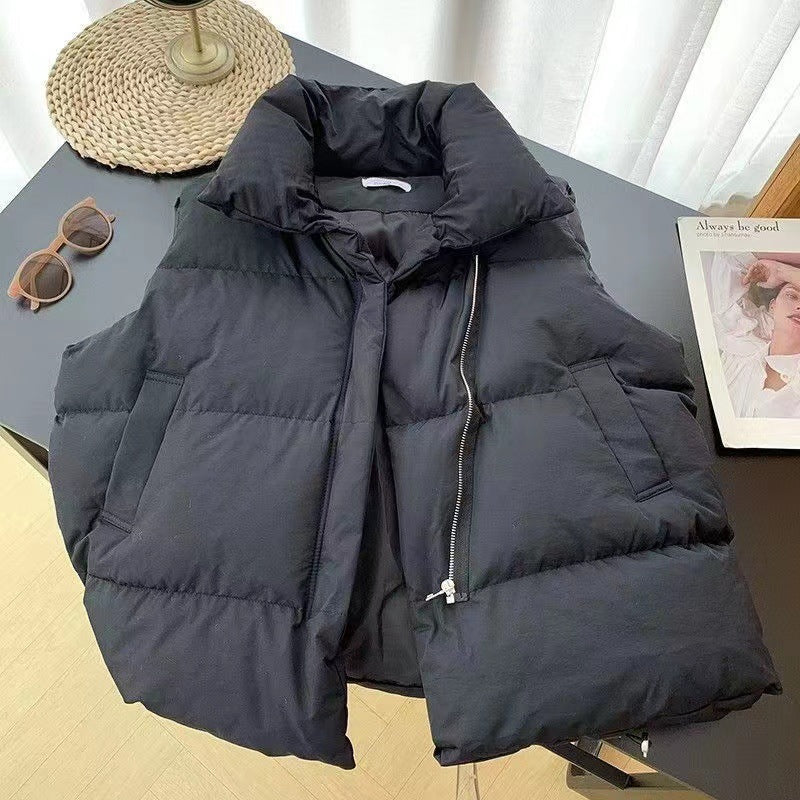 Korte gewatteerde damesbodywarmer, winterbodywarmer met opstaande kraag