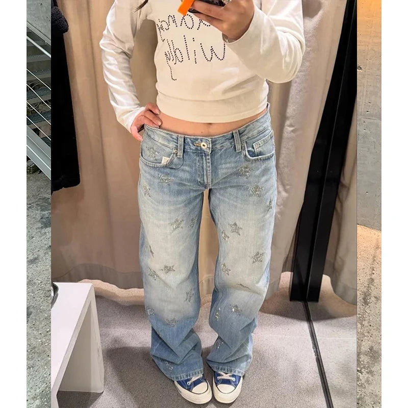 Lichtblauwe damesjeans met wijde pijpen, sterren, glitter en straight fit