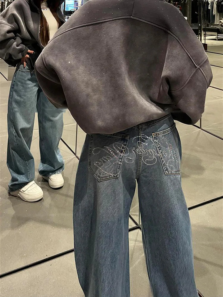 Damen Jeans Weites Bein Hellblau mit Verzierungen auf Gesäßtaschen
