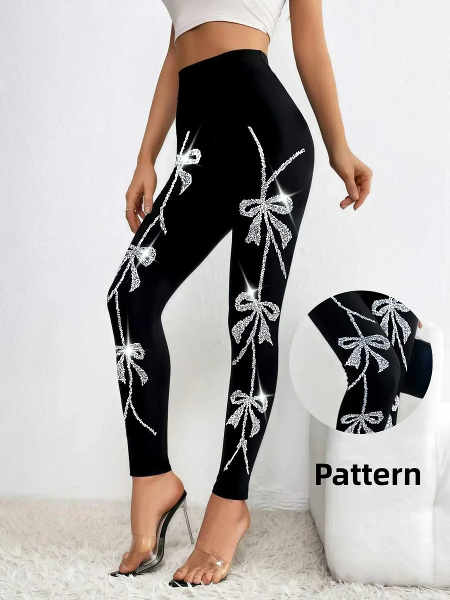 Damen Leggings Schwarz mit Glitzer-Schleifenmuster