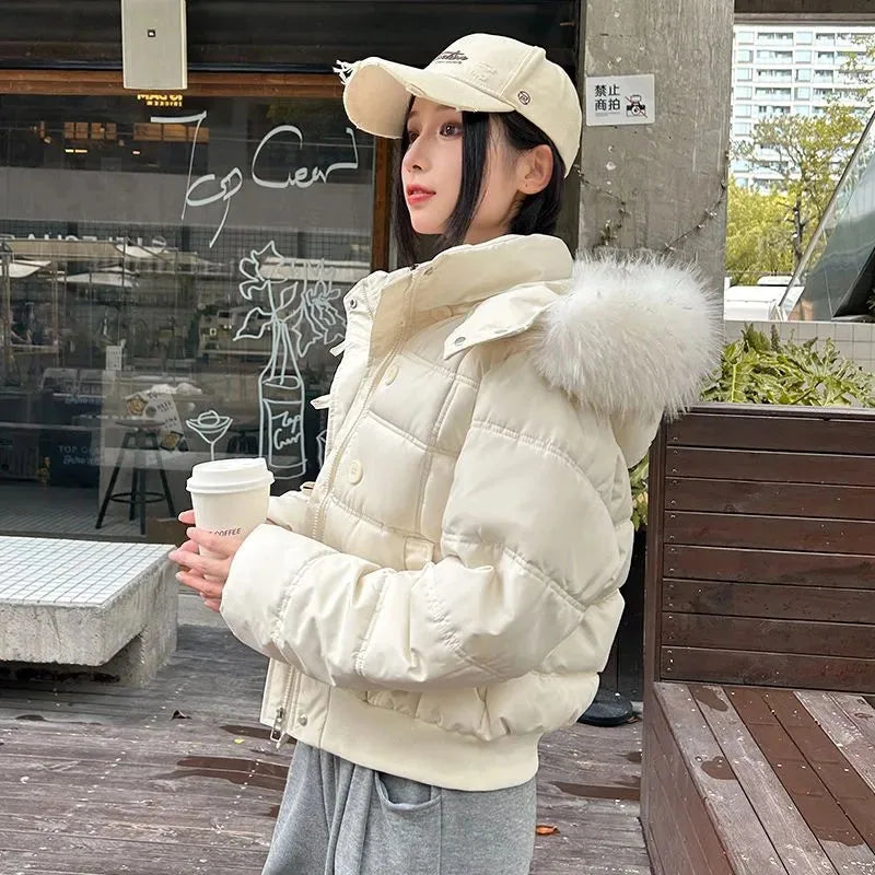 Kurze Damen Pufferjacke mit Kapuze und Kunstfellbesatz Rosa