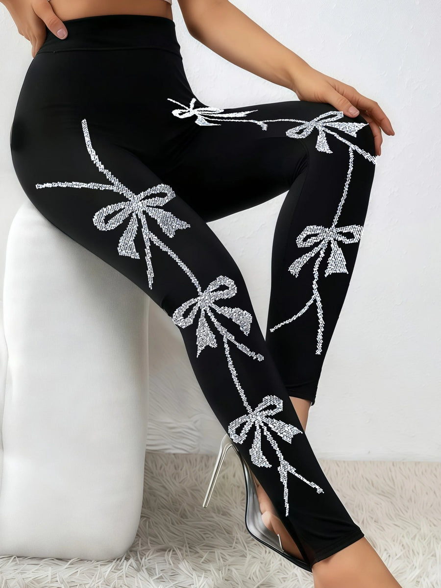 Damen Leggings Schwarz mit Glitzer-Schleifenmuster