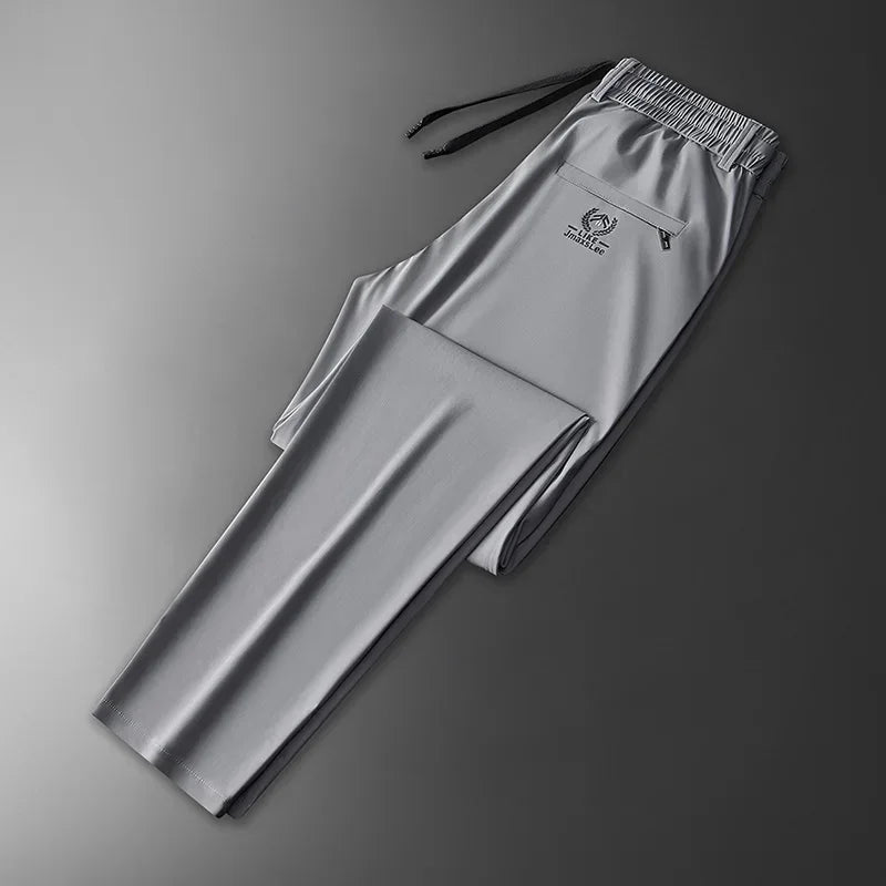 Vrijetijdsbroek voor heren met elastische tailleband en zak met rits