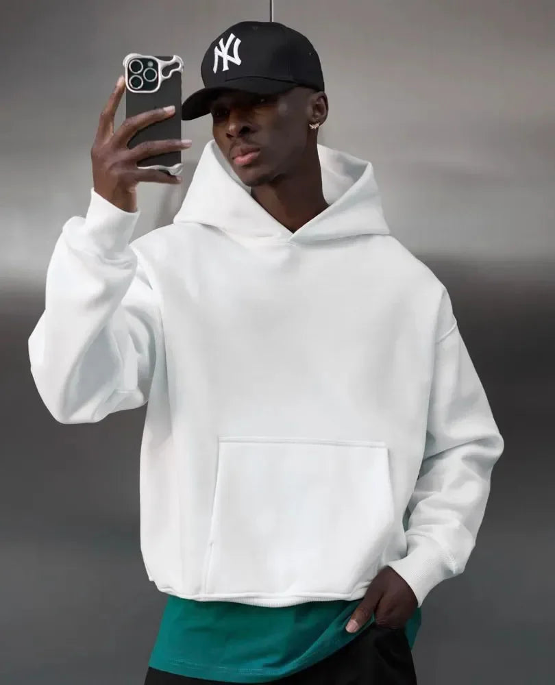 Unisex oversized hoodie met capuchon en kangoeroezak