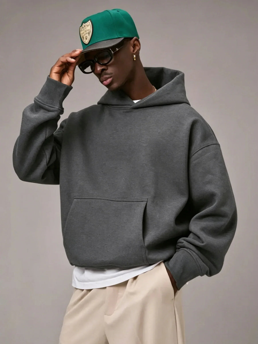 Unisex oversized hoodie met capuchon en kangoeroezak