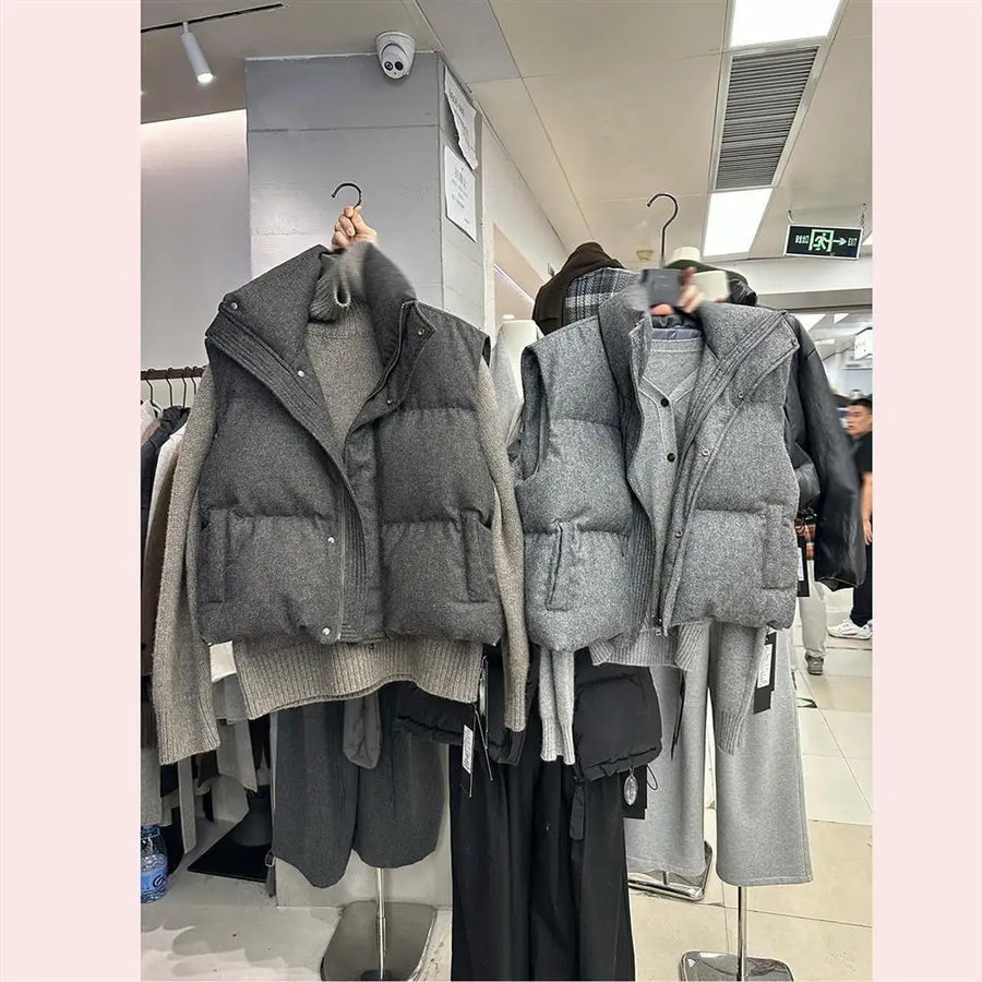 Unisex Steppweste Grau mit hohem Kragen und Taschen