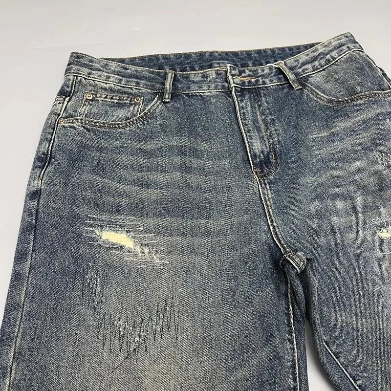 Herenjeans loose fit blauw in used look met wijde pijpen en distressed-effect