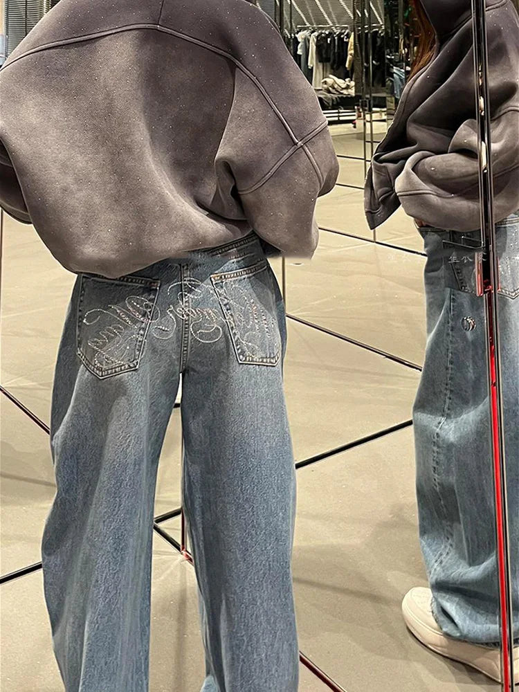 Damen Jeans Weites Bein Hellblau mit Verzierungen auf Gesäßtaschen