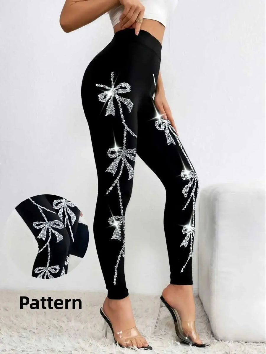 Damen Leggings Schwarz mit Glitzer-Schleifenmuster