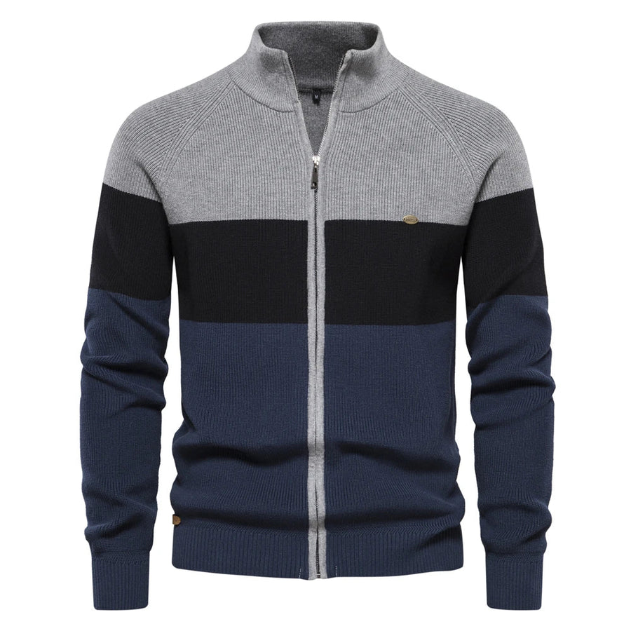 Herenvest met rits, opstaande kraag en kleurvlakken, marineblauw en bruin